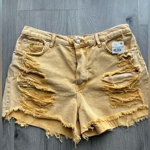 Free People Maggie Distressed Mid Rise Button Fly Shorts Lemon size 32 NWT